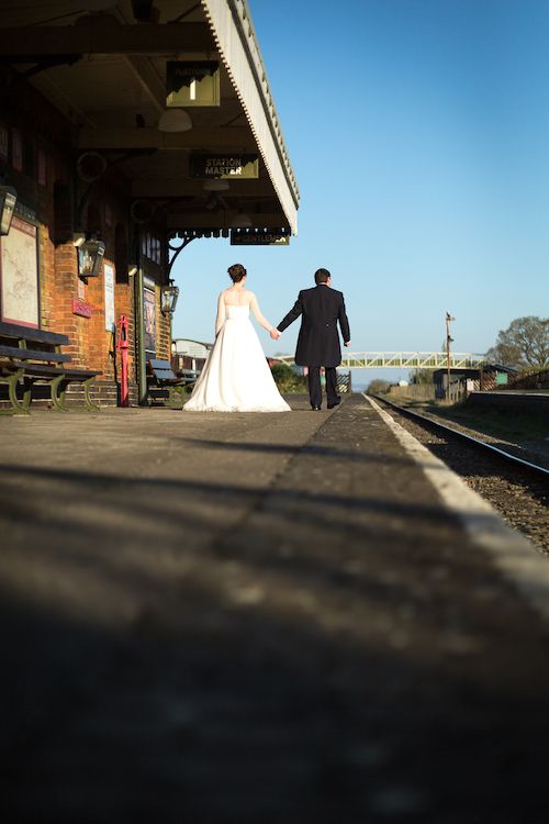 Emma and James walk down the railway platform at Buckinghamshire Railway Centre
