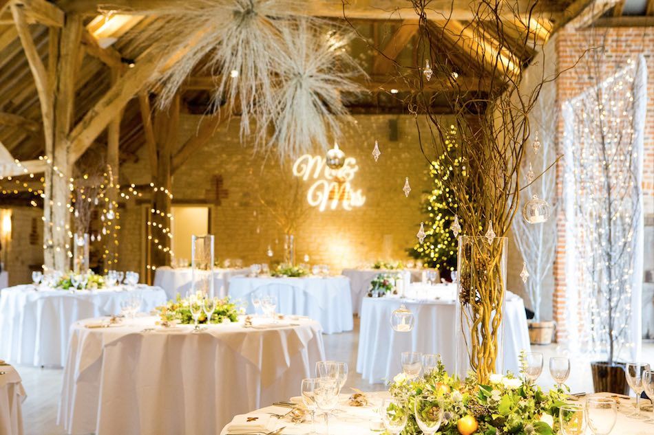 Hannah and Mike Winter Wedding at Bury Court Barn - winter decor by Em J Photography. Videography by Veiled Productions