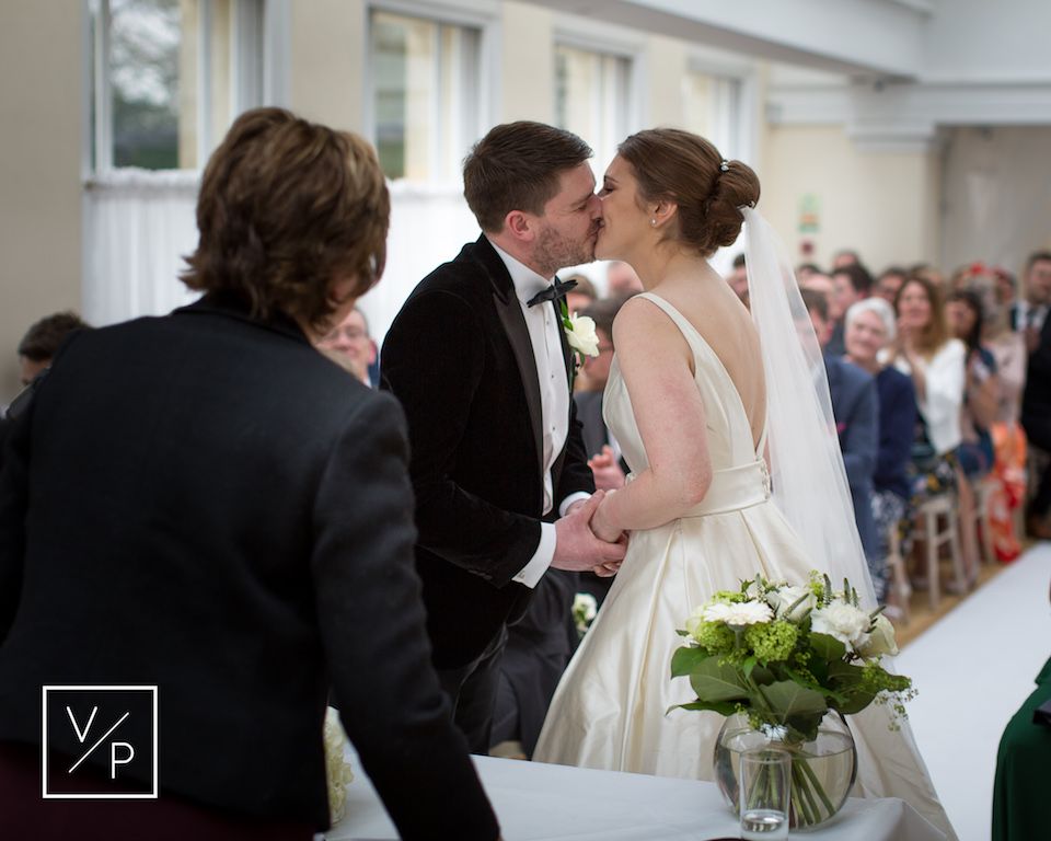 A spring Pembroke Lodge wedding - Liz and Luke seal their wedding with a kiss - photography and videography by Veiled Productions - Pembroke Lodge wedding videographer