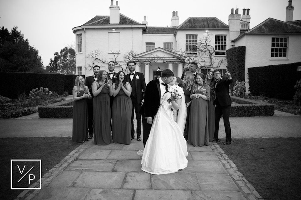 Liz and Luke with their wedding party - a spring pembroke lodge wedding - photography and videography by Veiled Productions