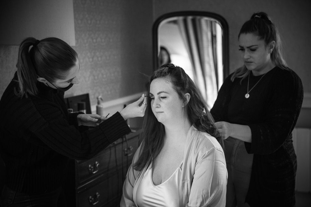 Aimee having her hair and make up done on the morning of her wedding. Photo by Mark Lord Photography.