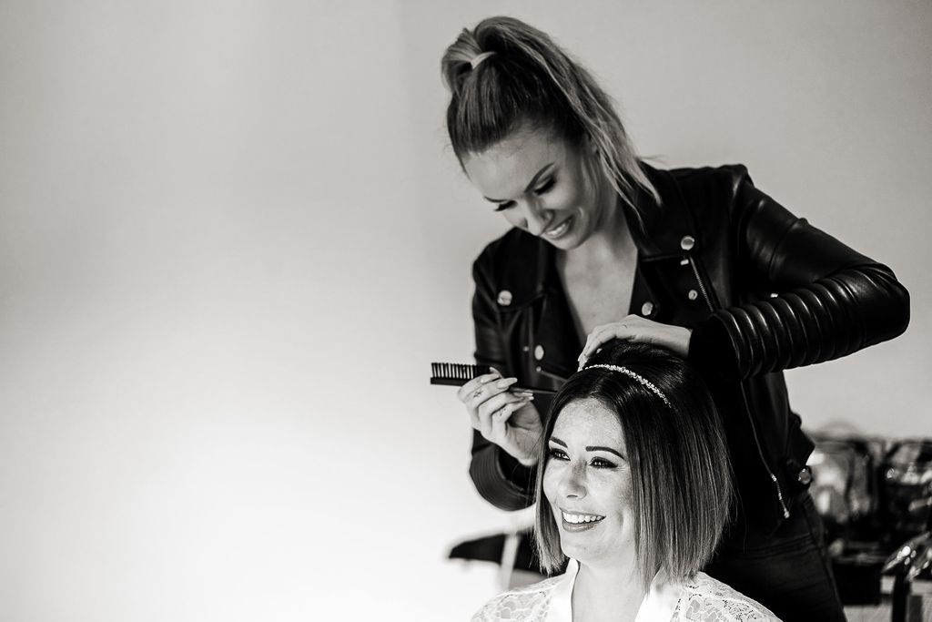 Amy having her wedding hair and make up done. Wedding photo by Allister Freeman. Videography by Veiled Productions - unique wedding videographer Bury Court Barn