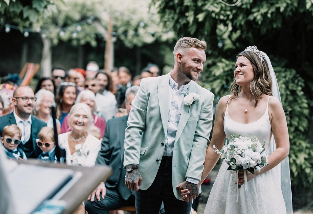 Erin and Vinnie steal a look of love during their civil ceremony in front of their closest family and friends - photography by The Kensington Photographer