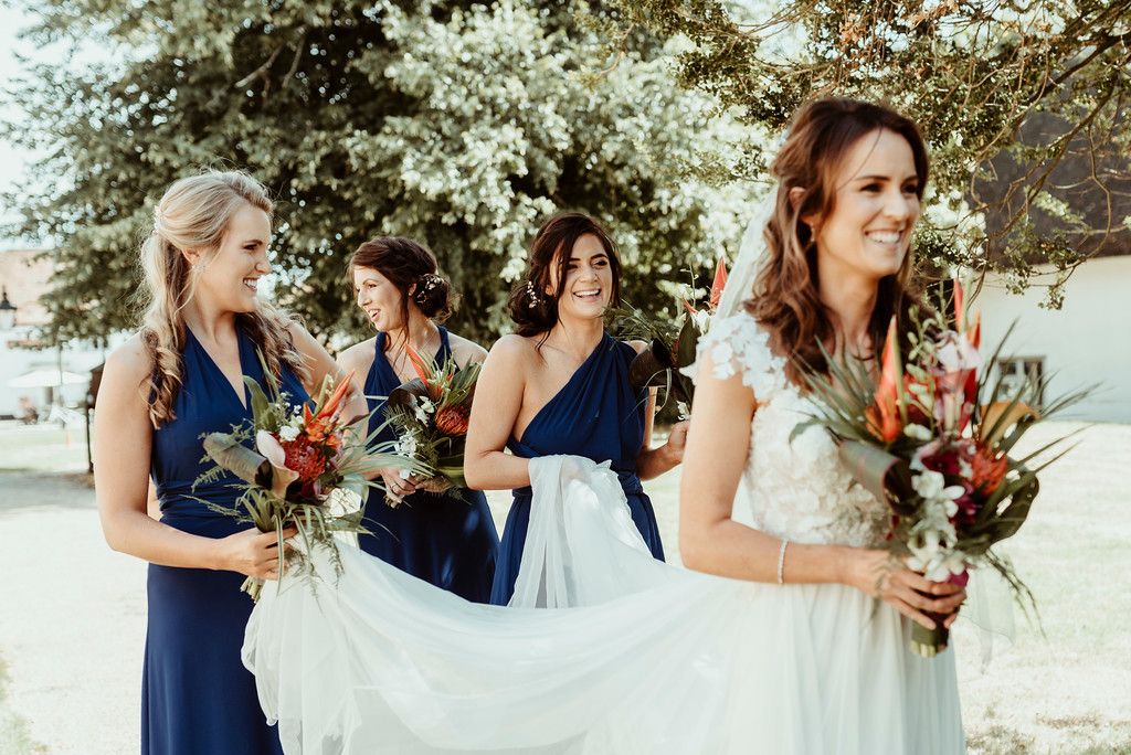 Jenny and Charlie Caribbean themed wedding - bride and bridesmaids arrival - photography by Jess Soper Photogaphy, videography by Veiled Productions