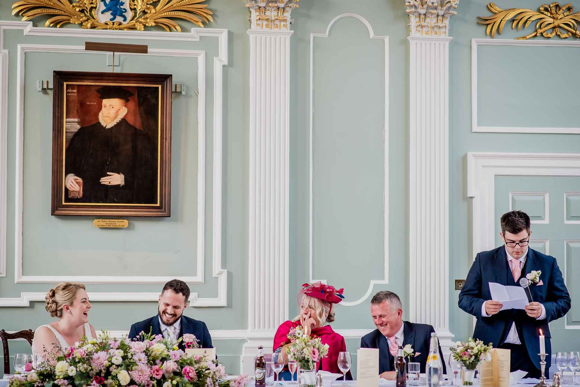 Best man giving the speech at the top table at Emmanuel College. Photo by Damien Vickers Photography. 