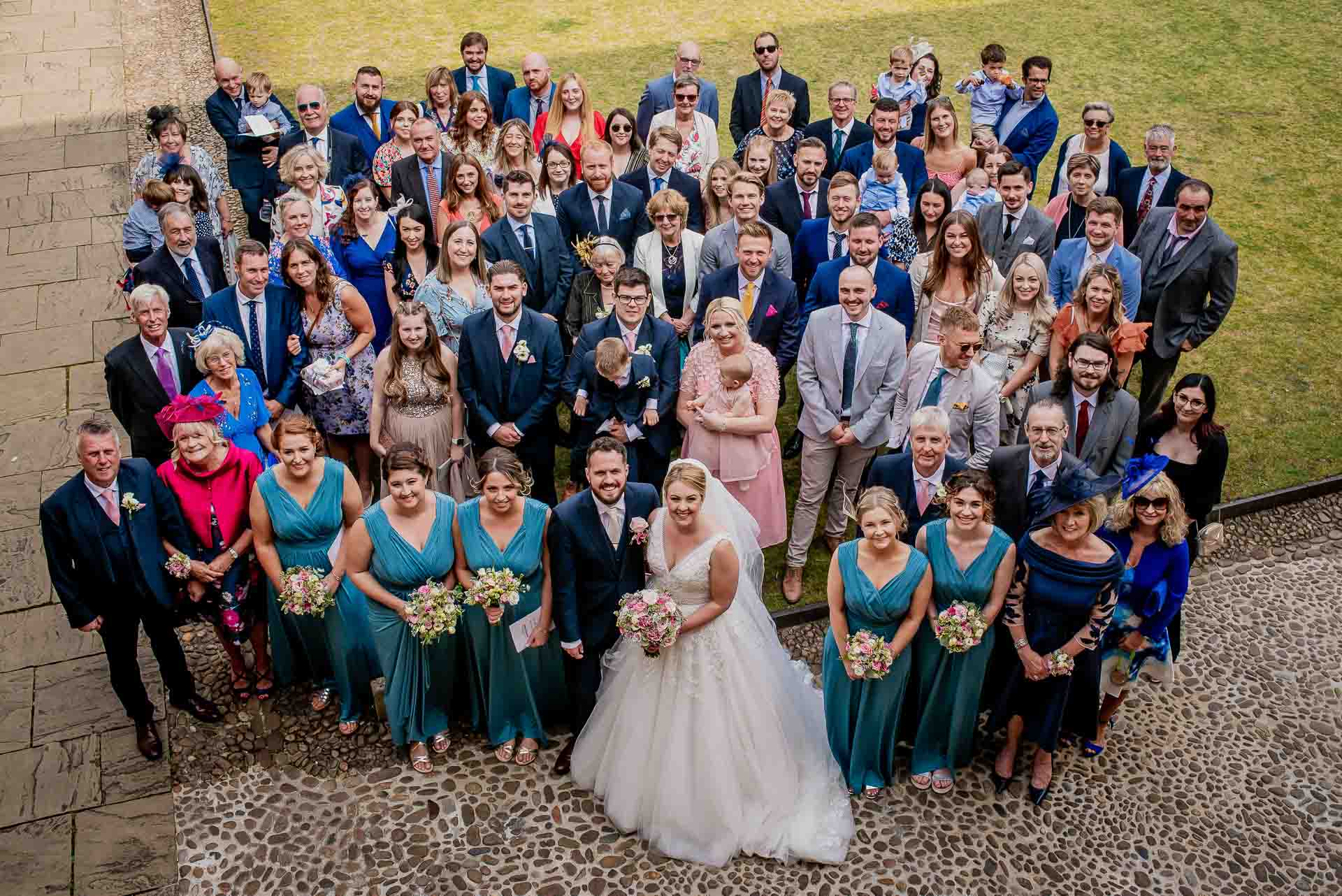 Leah and Nic and all their guests photographed from the first floor of Emmanuel College so all their faces can be seen! Photo thanks to Damien Vickers Photography. 