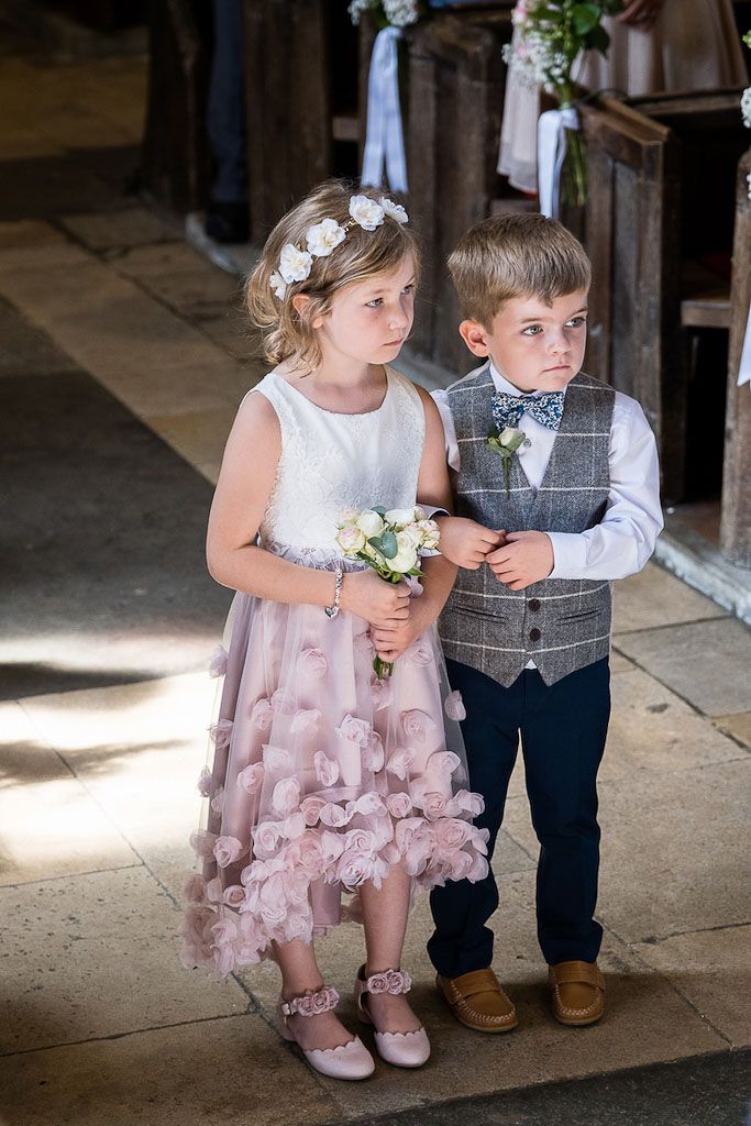 Cutest flower girl and page boy walking down the aisle - Rebecca and Mark wedding - photography by Rob Wheal Photography | Oxfordshire wedding videography by Veiled Productions