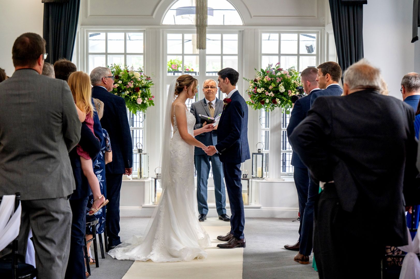 Sophie and Ross making their wedding vows to each other at Swynford Manor. Photo thanks to Fountain Photography.