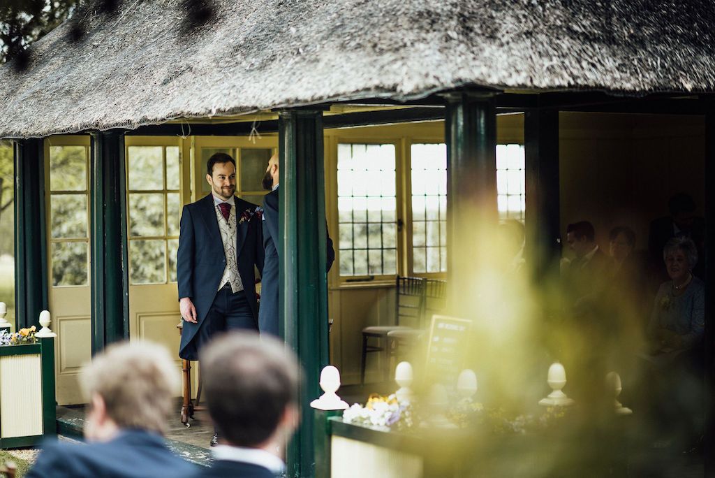 Sam waiting for Jess to arrive and for the wedding ceremony to begin in The Summer House at Shuttleworth House. Photo thanks to Michelle Wood Photographer.