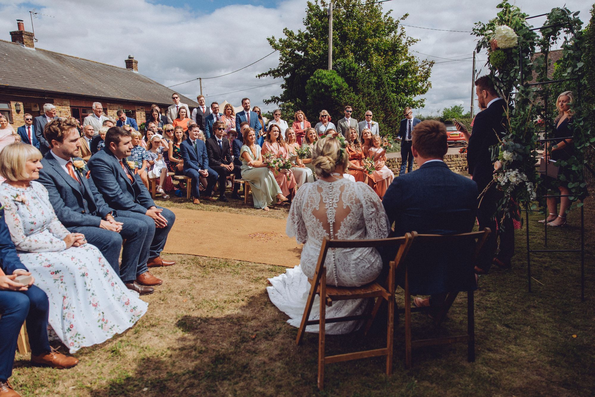 Best friends give a special reading about the happy couple during the personal, celebrant-led wedding ceremony. Photo thanks to Fordtography. 