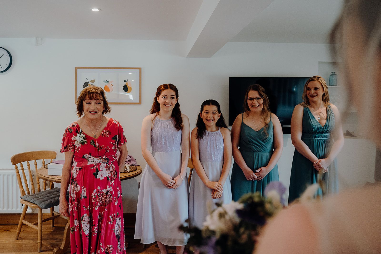 Georgie's Mum and bridesmaids first reaction to seeing her in her wedding dress with her bouquet. So many smiles and happy tears. Photo thanks to Sam and Steve Photography. 