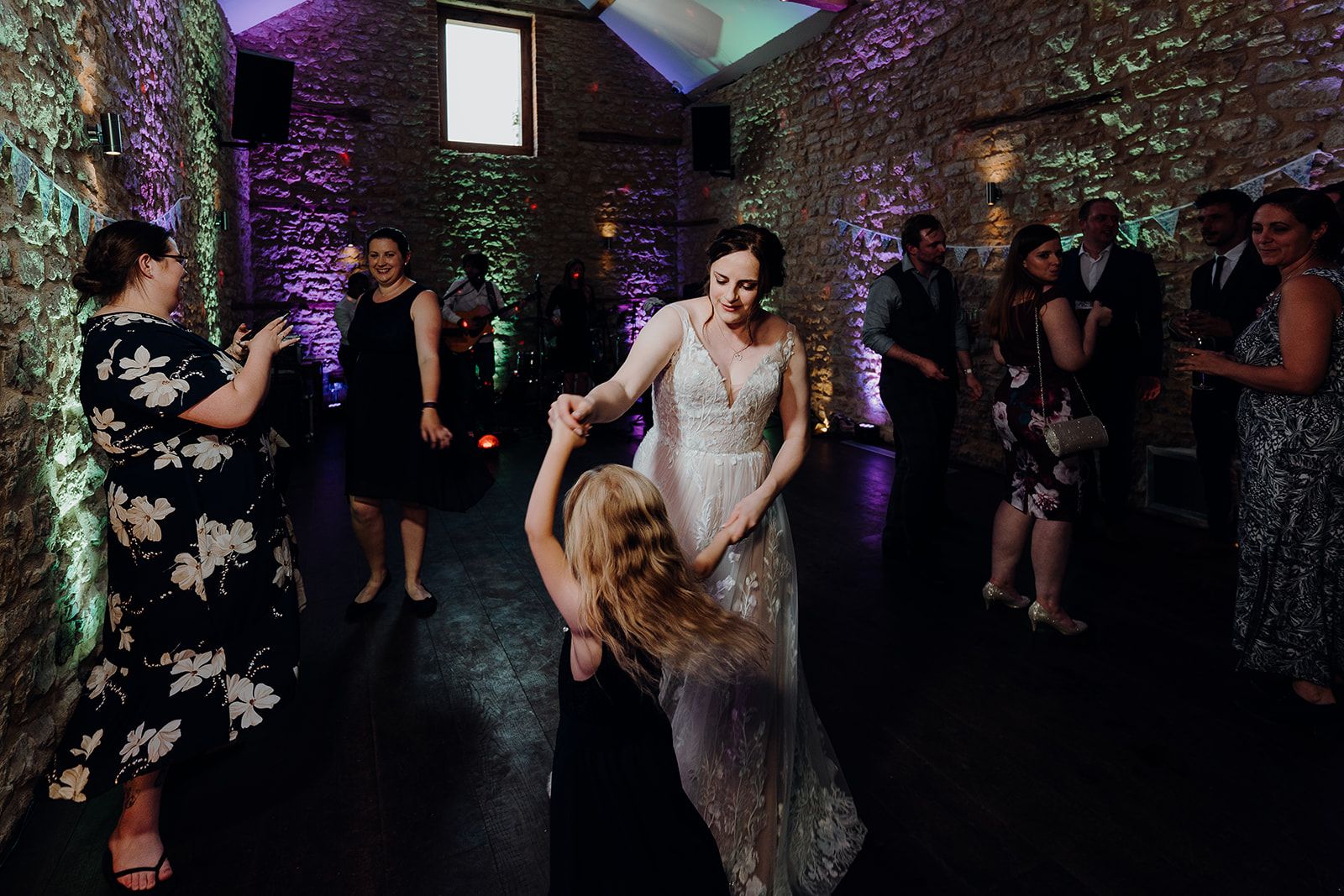 Georgie dancing with guests on the dance floor at Huntsmill Farm. Photo thanks to Sam and Steve Photography. 