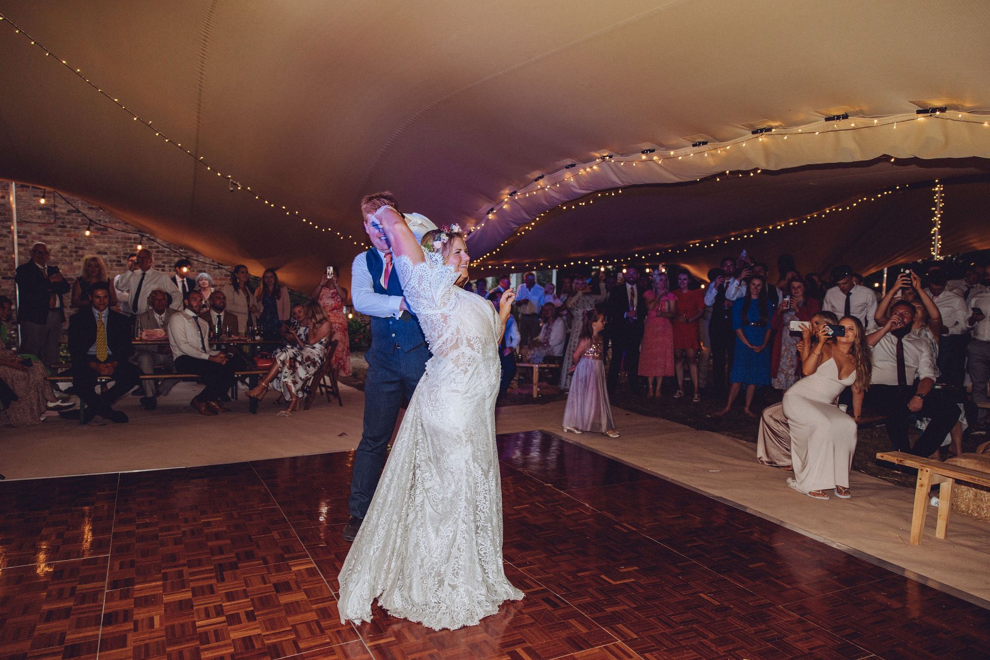 Nor and Dan dancing their first dance as a married couple in their tipi wedding. Photo thanks to Fordtography weddings.