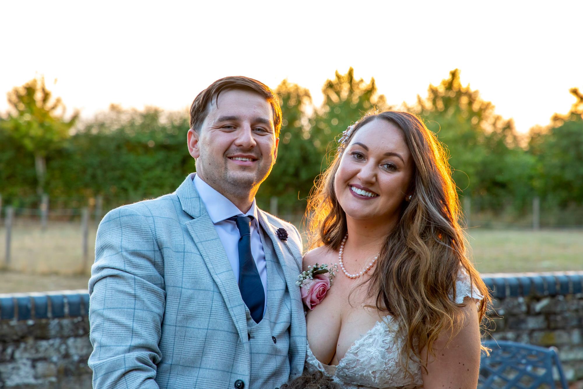 Joanna and Rafal at sunset in front of the orchard at South Farm in Cambridgeshire. Photo thanks to Nigel Charman Photography.