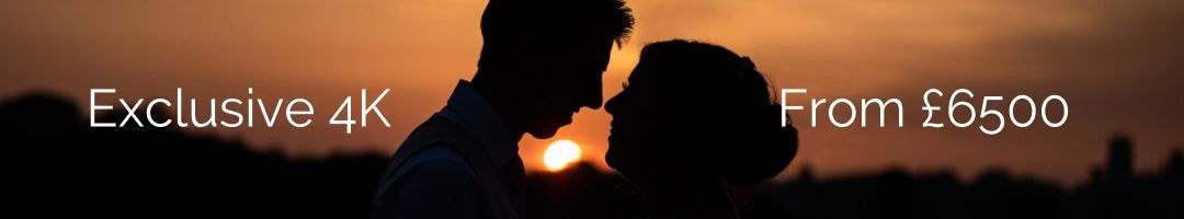Exclusive 4k wedding video package | silhouetted image of a couple kissing in the sunshine
