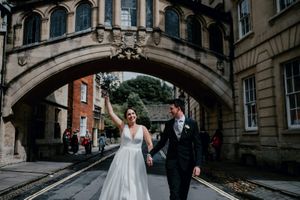 Adrianna and James stood in front of the Bridge of Sighs in Oxford. Photo thanks to Matt Fox Photography.